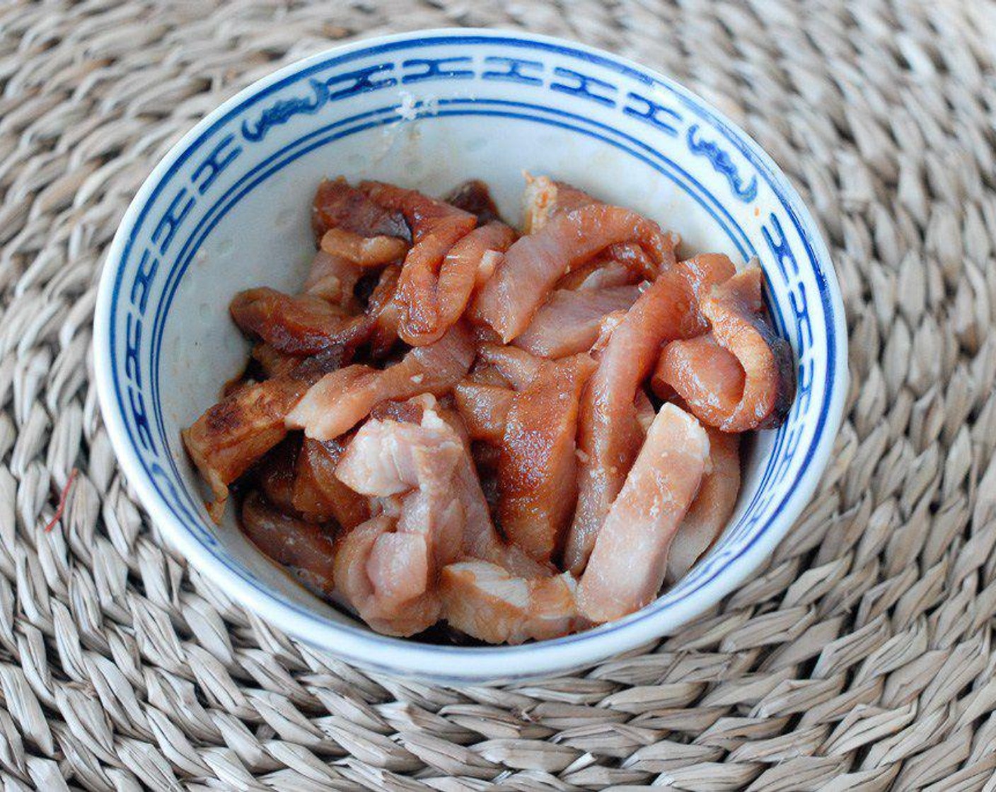 step 1 Cut the Pork (3.5 oz) into long strips, marinate with Soy Sauce (to taste), Granulated Sugar (to taste) and Corn Starch (to taste) for 20 minutes.