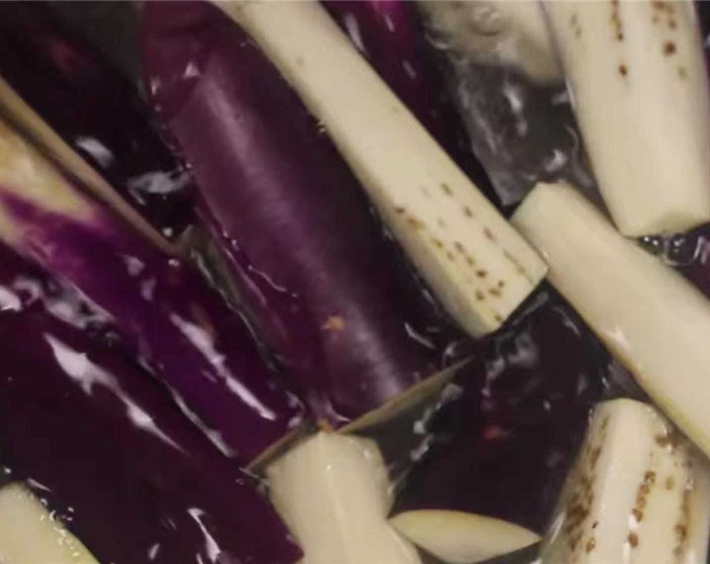 step 10 Soak the eggplant in the salted water for about 5 to 10 minutes.