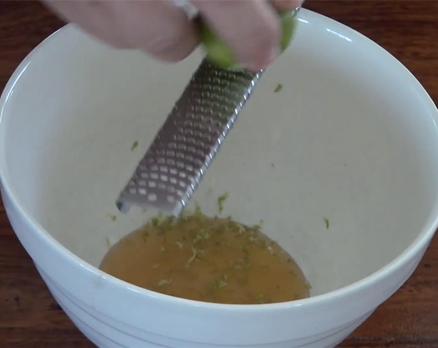 step 5 While the wings are roasting, in a bowl add zest and juice from Limes (2 1/2) and Honey (1/4 cup).