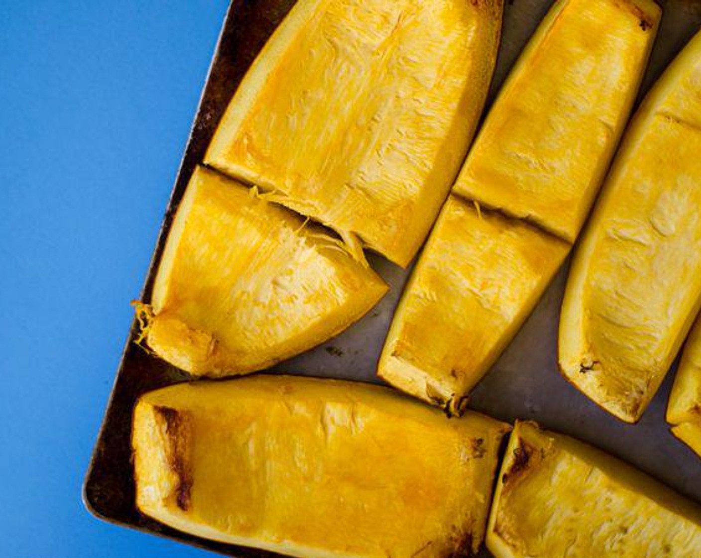 step 2 Place Pumpkin (1) pieces facedown on a baking sheet. Bake at 350 degrees F (180 degrees C) for 1 to 2 hours, or until inside is easily pierced with a fork.