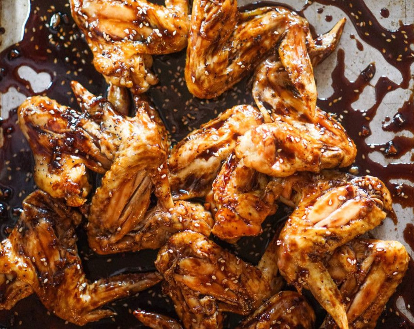 step 8 Transfer the wings to a crock pot set at low. Add the teriyaki sauce and toss to fully coat the wings. You want to make sure the wings are kept at at least 140 degrees F (60 degrees C) to keep them safe for eating.