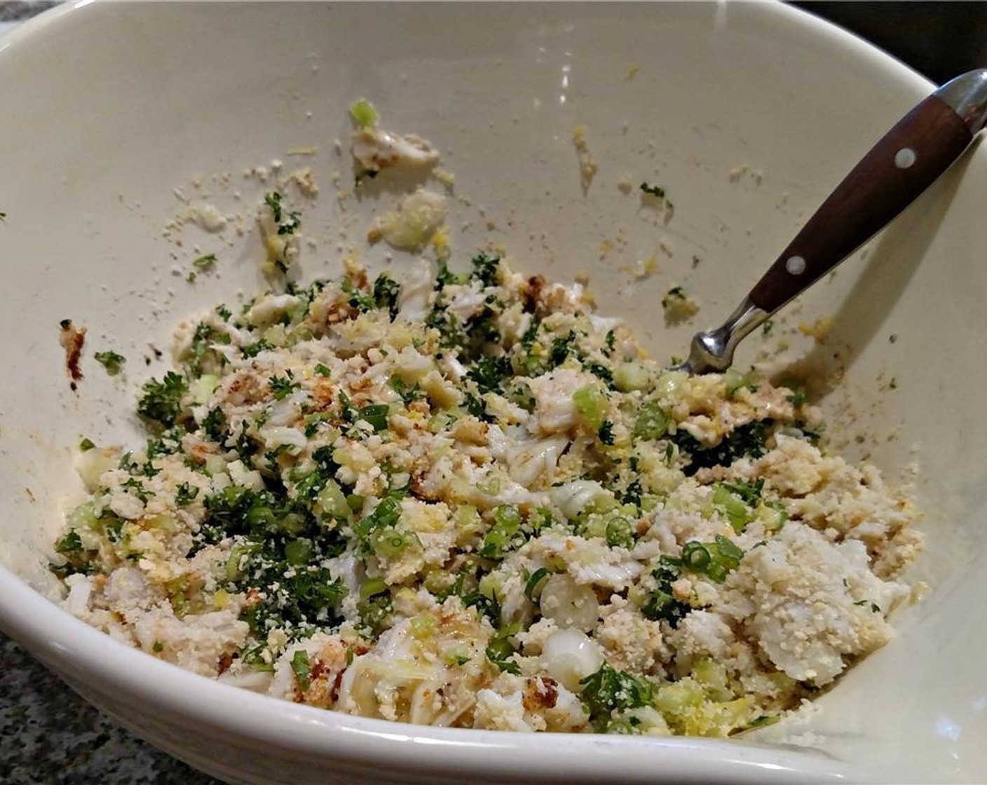 step 2 In a large bowl, mix Celery (1/2 cup), Scallion (1/2 cup), {@11:}, Lemon (1), Gluten-Free Bread (1 cup), Fresh Parsley (1/2 cup), Mayonnaise (1/3 cup), Worcestershire Sauce (1 tsp), Old Bay® Seasoning (1 tsp), Dijon Mustard (1 tsp), {@10:}, and Ground White Pepper (1/4 tsp). Carefully add the crab last, taking care not to break up the lumps as you incorporate it.