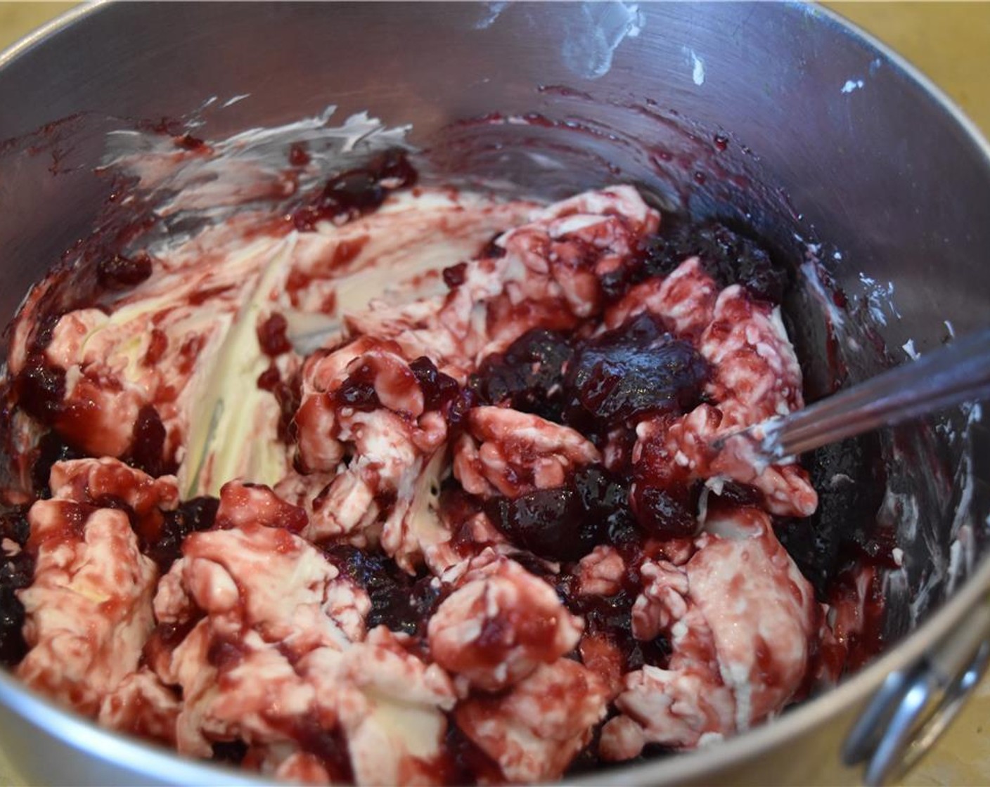 step 2 Incorporate the Seedless Raspberry Jam (1 jar) gently with a large wooden spoon.
