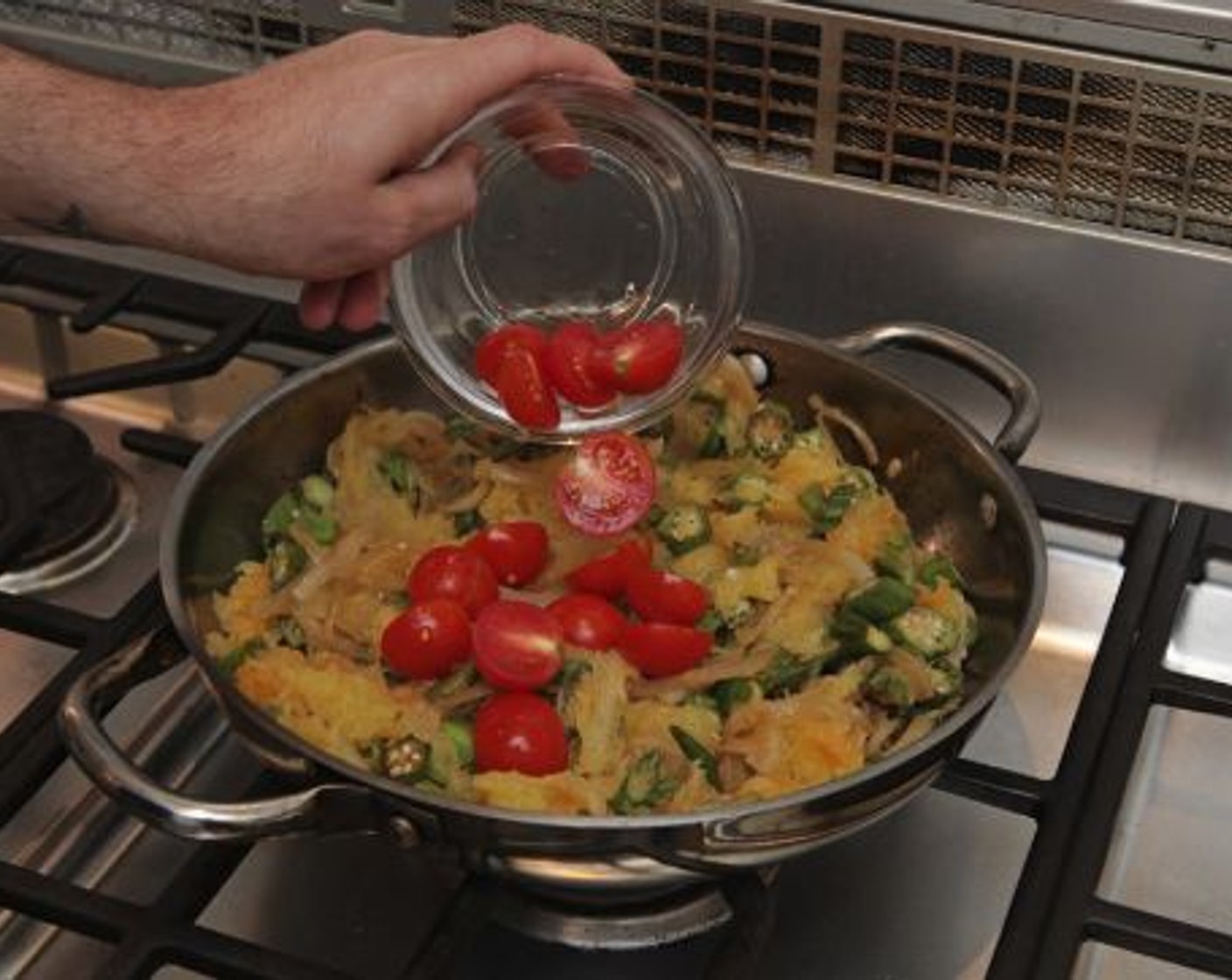 step 11 While the meat is resting, return the pan with the vegetables over medium heat, and add the tomatoes. Cook, stirring gently, until fully heated. Taste and season with Kosher Salt (to taste) and Finely Ground Black Pepper (to taste).