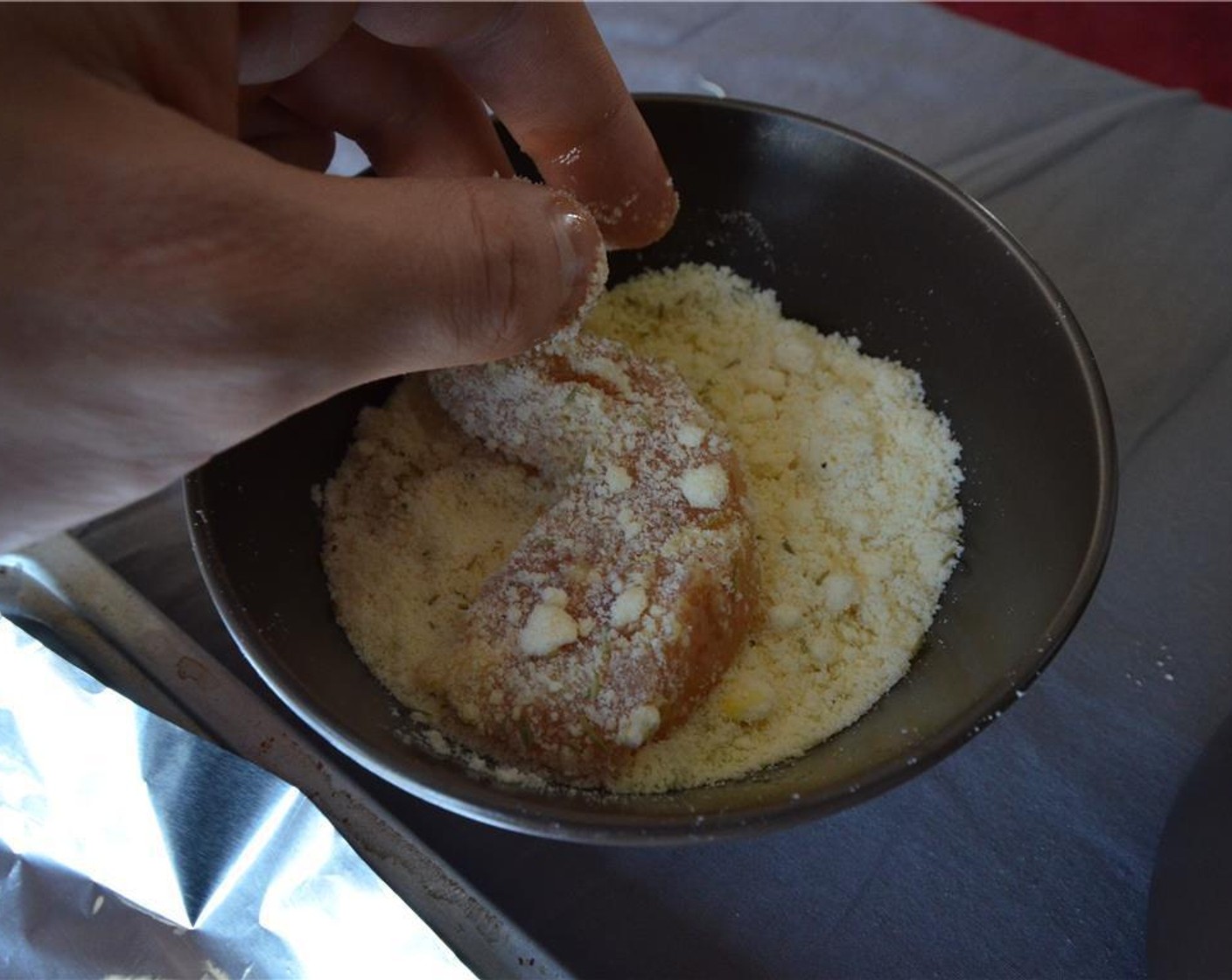 step 4 Dip the Chicken Tenders (1 lb) into the egg, then dredge in the flour mixture.