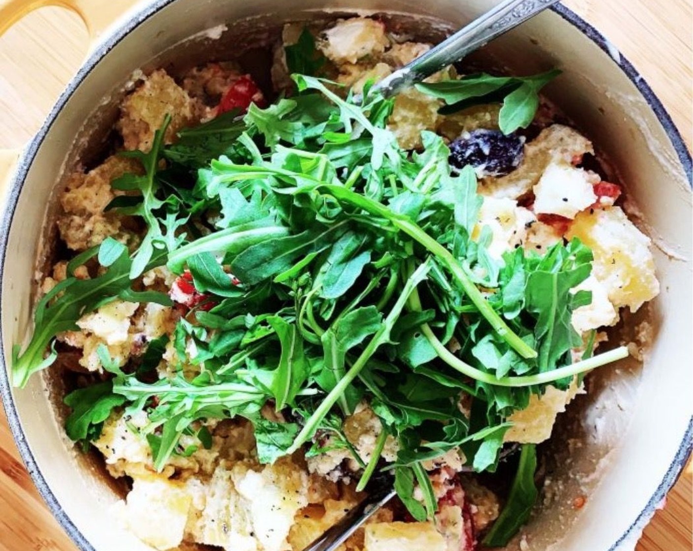 step 3 Add dressing to the salad along with Arugula (3 cups), and stir until all ingredients are combined.