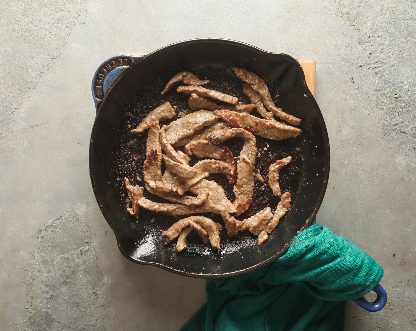 step 3 Heat the Vegetable Oil (2 Tbsp) in a skillet over high heat. Once the oil is sizzling, add the beef. Cook, stirring frequently, for 4-5 minutes or until browned.