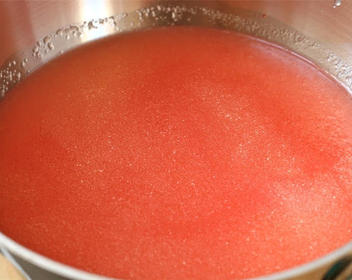 step 3 Pour the grapefruit juice in a small saucepan and sprinkle with Gelatin Powder (2 pckg). For color, add Cherry Gelatin (1/8 tsp). Let it soak for a minute or two.