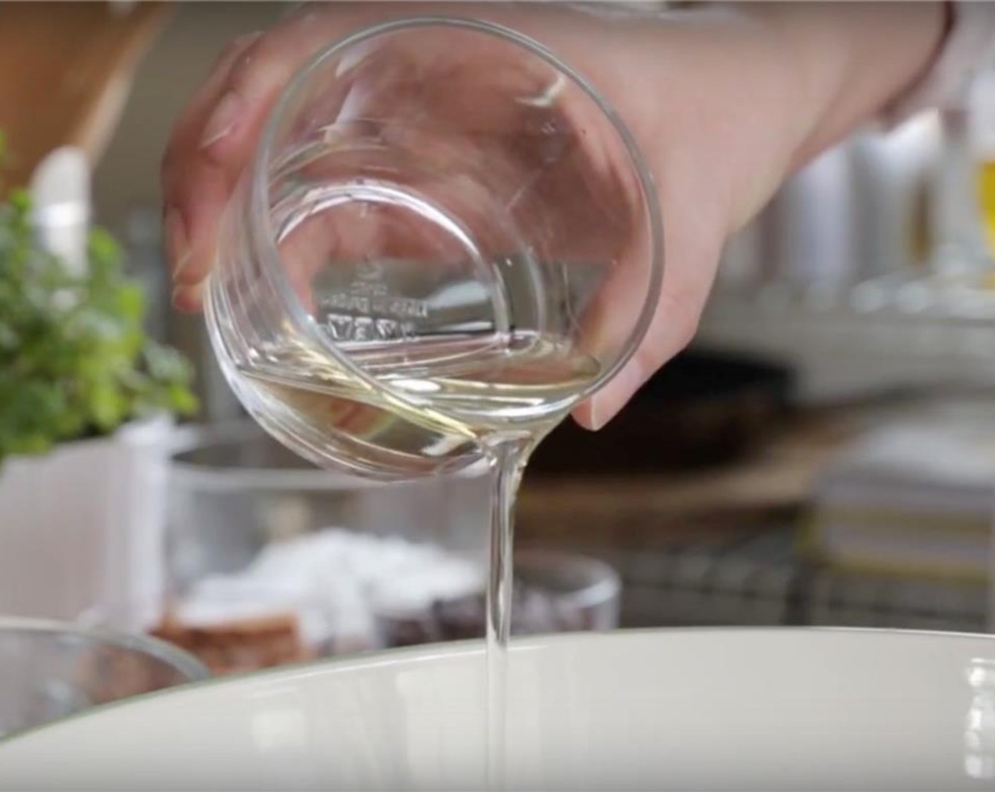 step 2 In a large bowl, add in Vegetable Oil (1/4 cup).