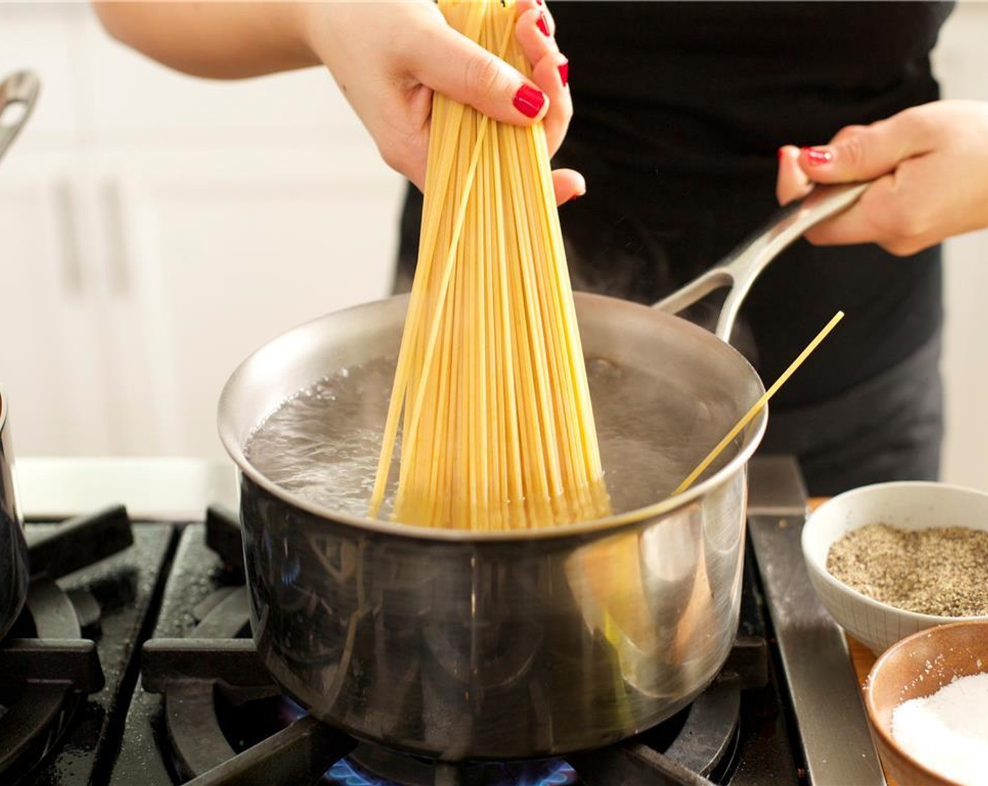 step 11 Bring eight cups of water to a boil with Salt (1 Tbsp) in a large saucepan. When water reaches a boil, add pasta. Cook for twelve minutes.