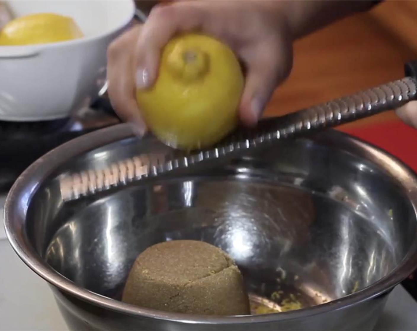 step 2 In a large bowl, add Brown Sugar (3/4 cup), zest and juice of the Lemons (2), Soy Sauce (2 Tbsp), and Worcestershire Sauce (4 Tbsp). Whisk together until the sugar is dissolved.