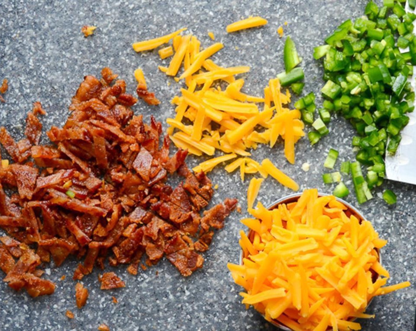 step 4 Seed and mince the Jalapeño Pepper (1). Chop the cooked bacon. Prepare the grated Cheddar Cheese (2/3 cup), if need be, and set aside.