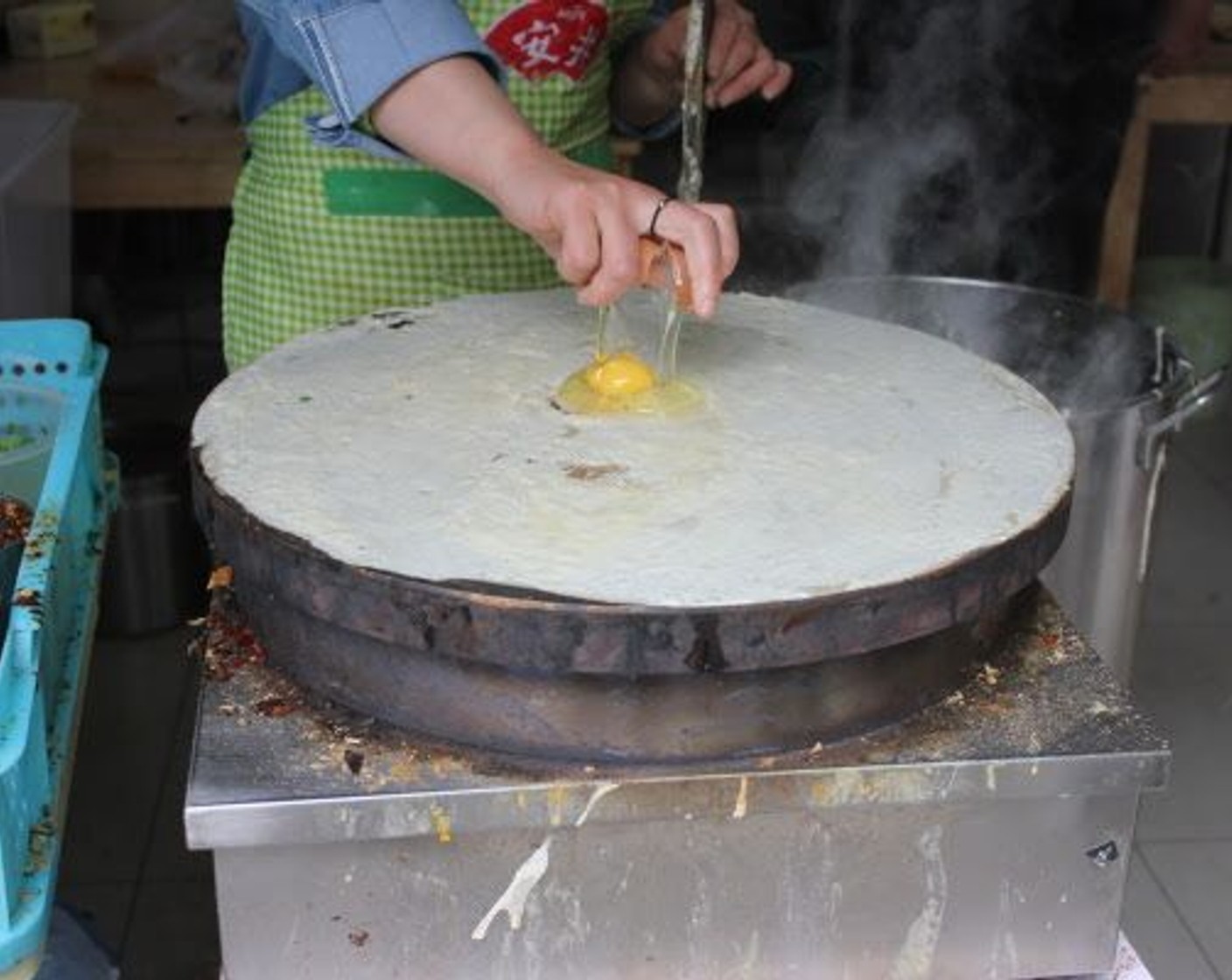 step 4 Crack and Egg (1) and spread it on top of the dough.