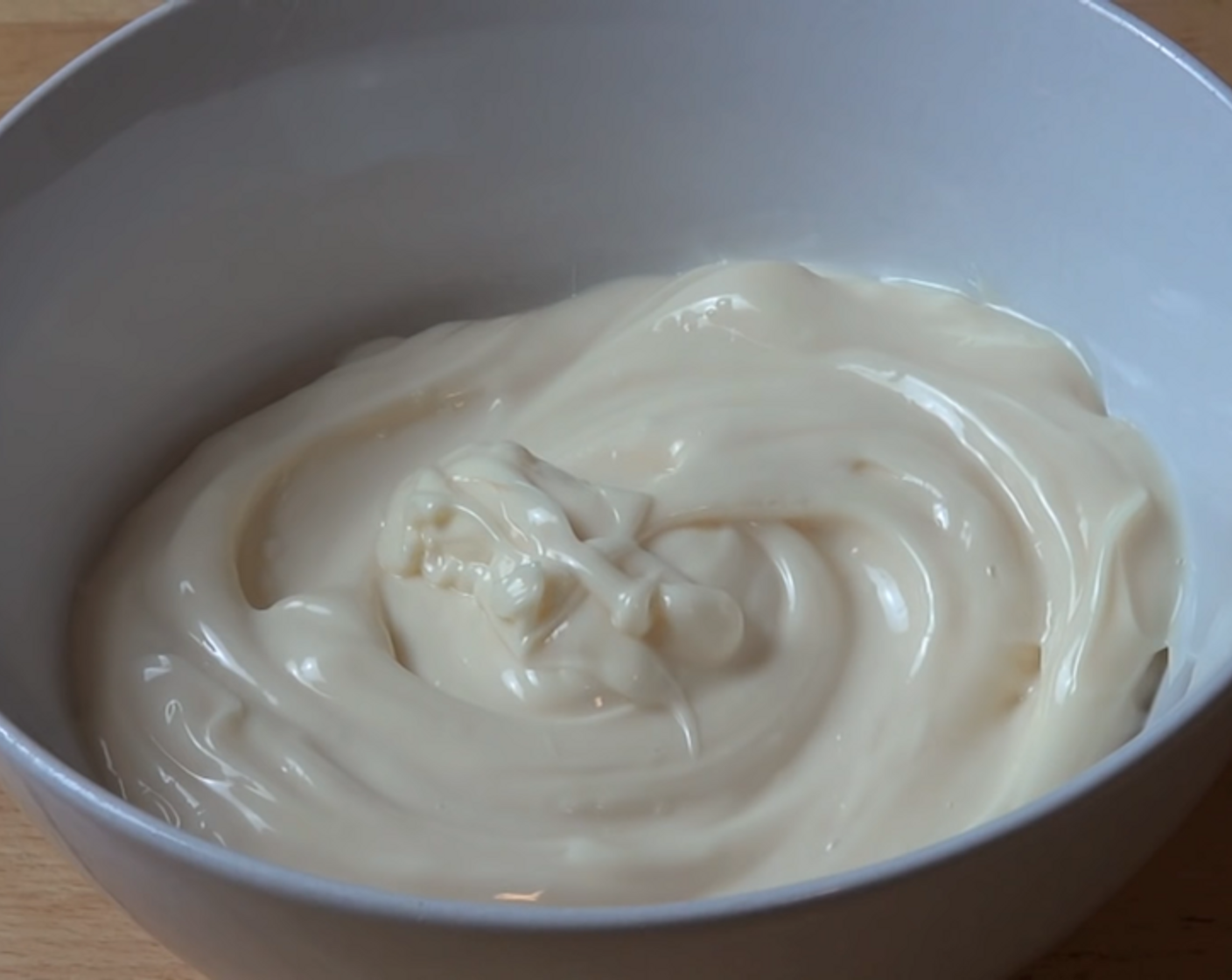 step 3 Into a mixing bowl, add your Mayonnaise (2 cups), Onion Salt (1 tsp), and Simply Organic Garlic Powder (1 Tbsp). Season with some Freshly Ground Black Pepper (to taste) and mix everything together.