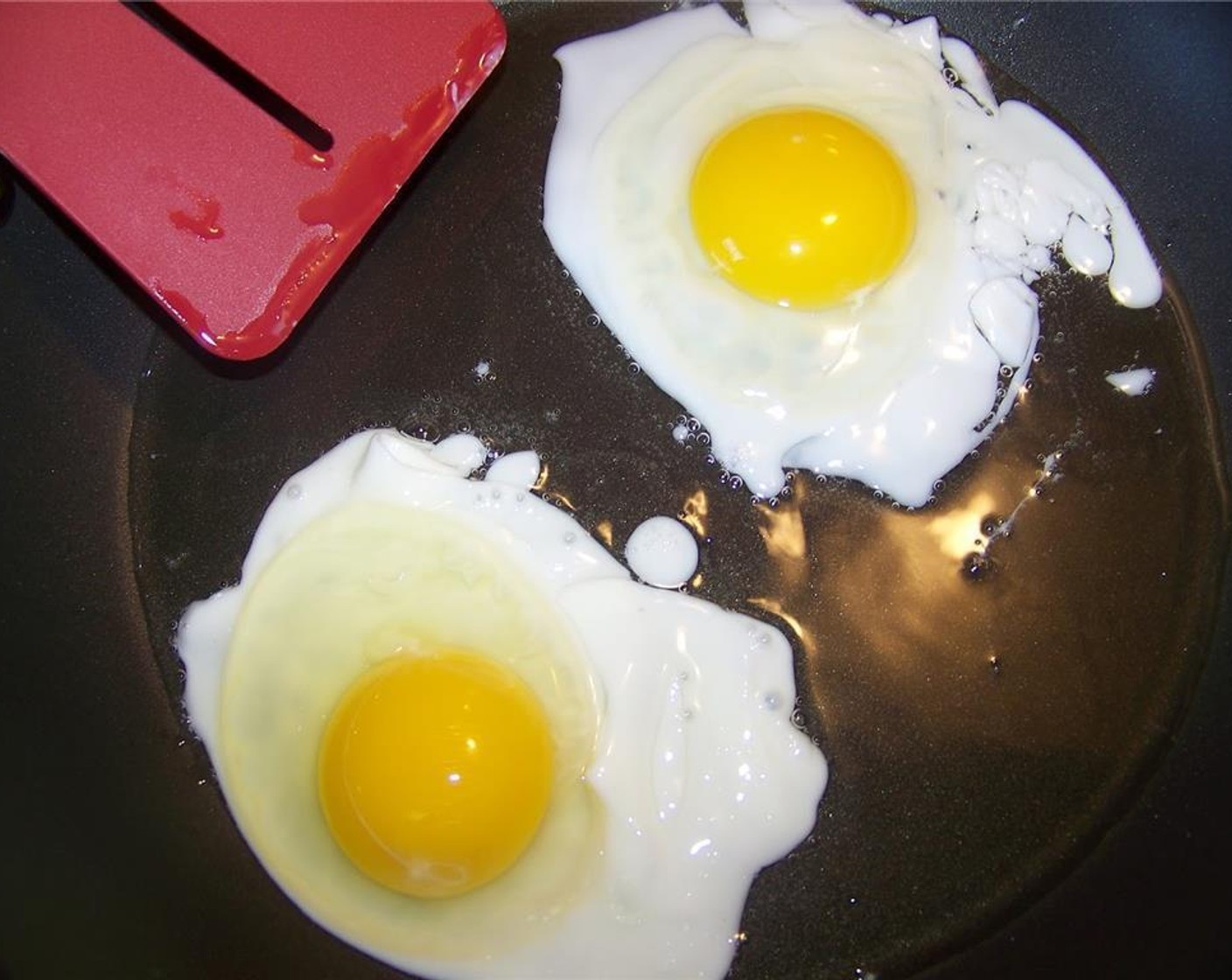 step 5 Fry the Eggs (4) in a pan and set aside.