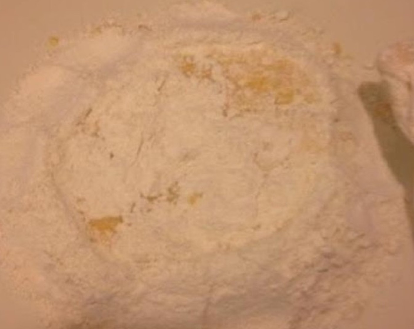 step 4 Slowly add in the flour and keep whisking until all flour has combined with the eggs.