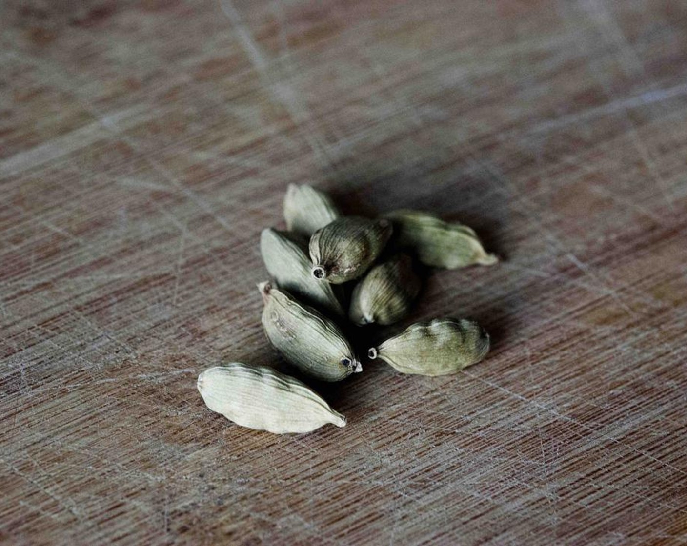 step 2 Meanwhile open up the Whole Cardamom Pods (1/4 tsp) and put the internal kernel into a small bowl.