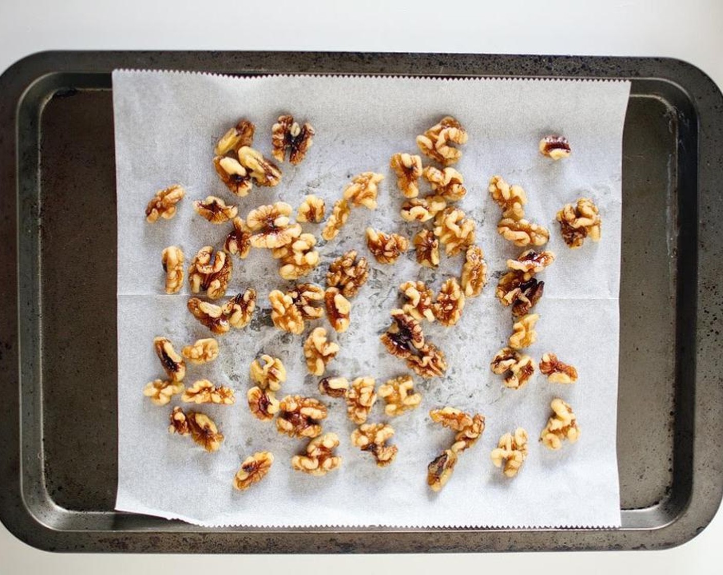 step 3 Drain walnuts and dry on a cookie sheet.