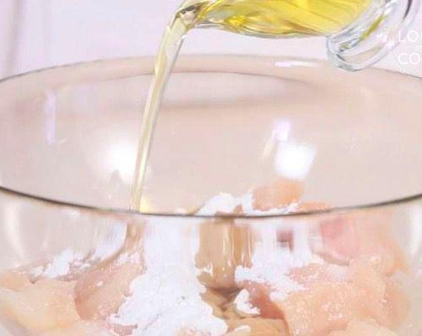 step 1 Marinate chicken: take a large mixing bowl, add Chicken (1.1 lb), Corn Starch (2 tsp), Soy Sauce (2 Tbsp), Sesame Oil (2 tsp) and mix well.