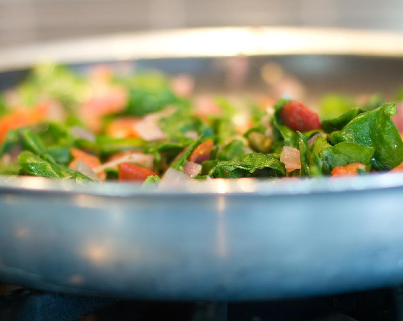 step 9 Add the Fresh Spinach (9 oz) and cook until it begins to wilt, about 2 minutes.