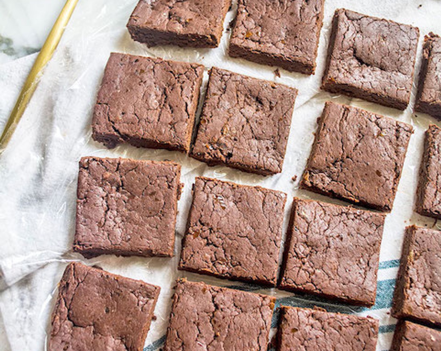step 5 Refrigerate 20-30 minutes, then using plastic wrap, lift the brownies out of the dish and cut them into 16 pieces.