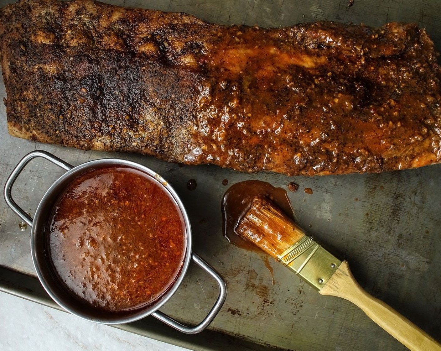 step 16 Brush the sauce on the front and back of the ribs.