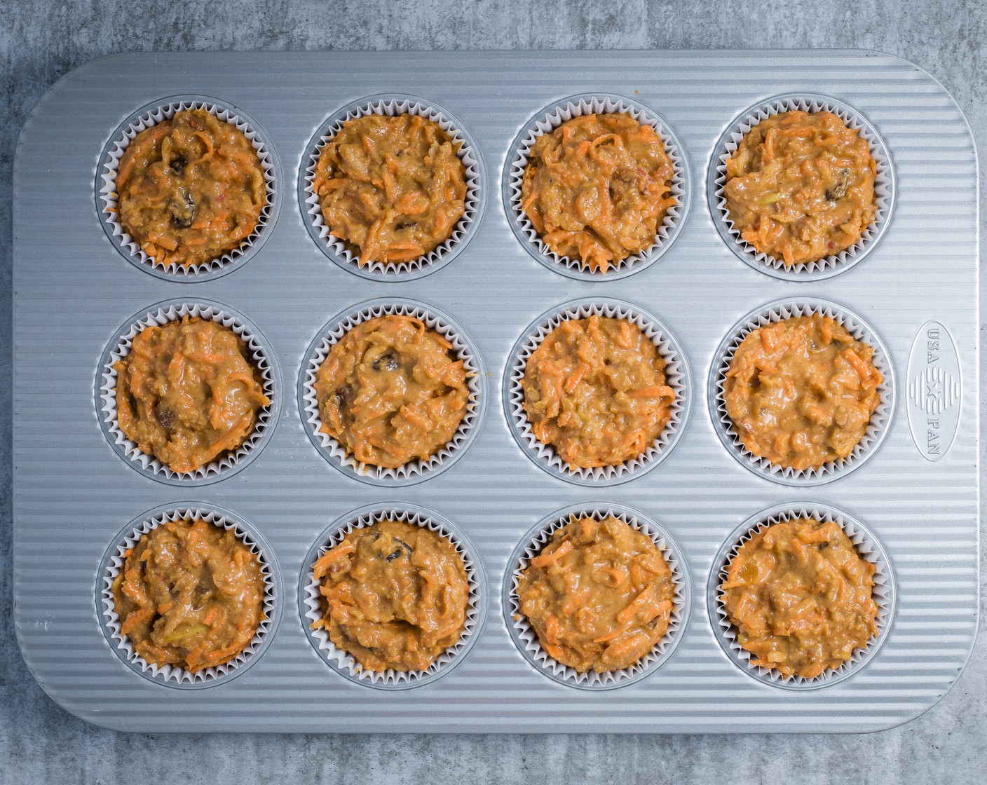 step 7 Bake until the muffins just spring back when pressed gently in the center, about 25 minutes.