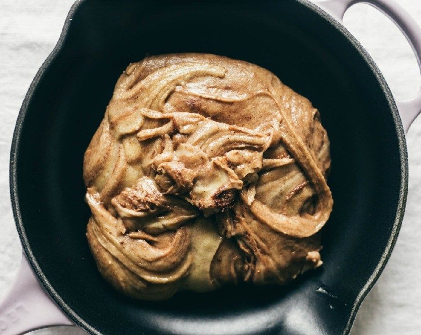 step 3 Sprinkle in the All-Purpose Flour (1 cup), Salt (1/2 tsp), Baking Soda (1/4 tsp), Ground Cardamom (1/4 tsp), and Ground Nutmeg (1/4 tsp). Mix until incorporated. Fold in the Ground Cinnamon (1/2 Tbsp) just until that batter starts to ribbon with cinnamon.