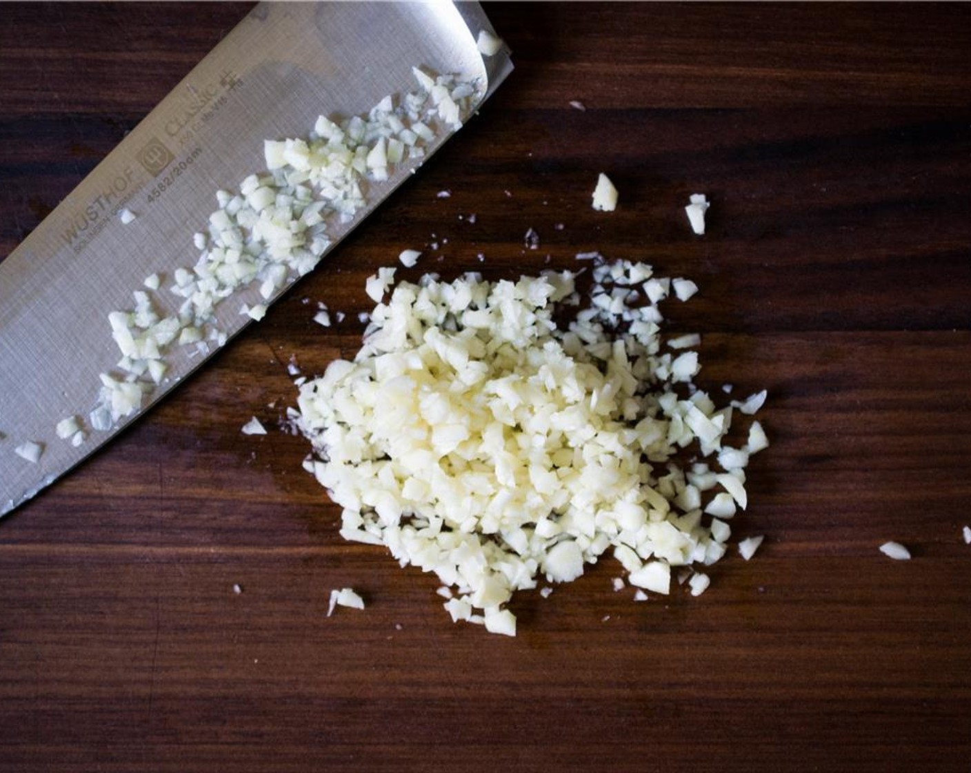 step 2 Mince the Garlic (4 cloves). In a medium sauce pan over medium heat, heat the oil and sauté the garlic just until fragrant – approximately 30 seconds.