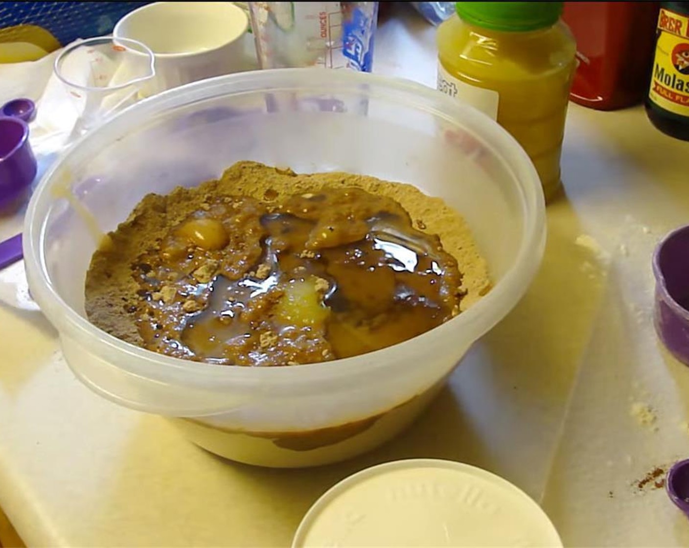 step 3 Pour in Water (1 cup), Apple Sauce (1/4 cup), and Canola Oil (1/2 cup).  Mix until well blended. Spread evenly in a greased 9x13 inch baking pan.