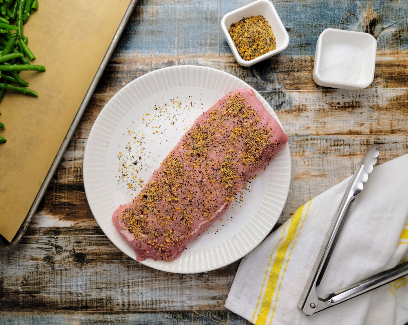 step 5 While the potatoes are cooking, add Olive Oil (2 Tbsp) to a skillet pan over medium-high heat. Pat dry the Pork Loin Filet (2 lb) with a paper towel and then season them all over with Steak Seasoning (2 Tbsp). Press the seasoning lightly onto the pork.