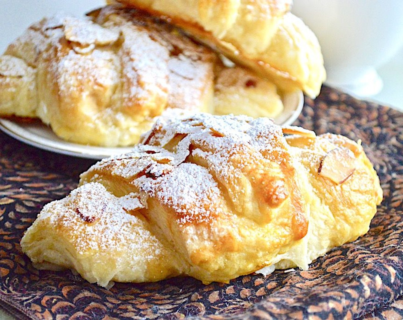 step 15 Bake the croissants for 30-40 minutes, until they are completely golden and crisp. Let them cool a bit and then sprinkle each of them with Powdered Confectioners Sugar (to taste). Serve warm with great coffee and enjoy!