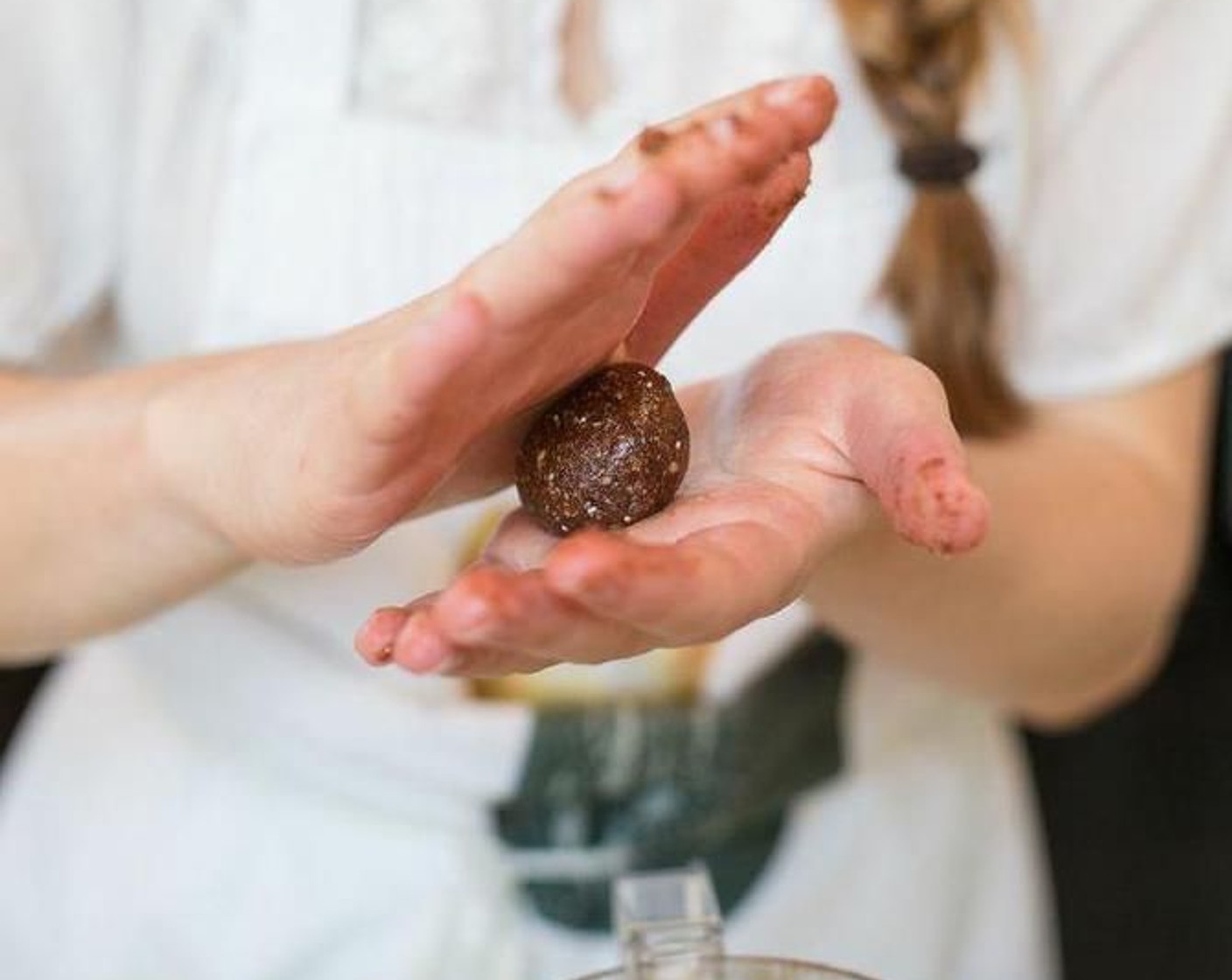 step 3 Roll the mixture into small little balls, then roll the balls in the extra Unsweetened Shredded Coconut (1/4 cup). Place the balls into a sealed Tupperware in the freezer for 1 hour to set.