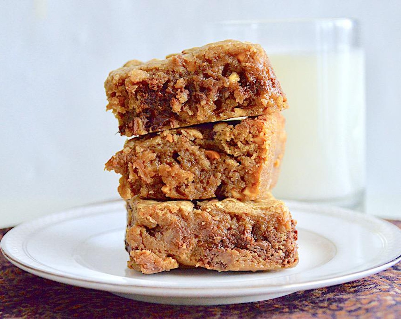 step 5 Let them cool completely, then cut into 16 squares by making 3 equal cuts both vertically and horizontally. Serve them immediately or store in an airtight container for up to 3 days.