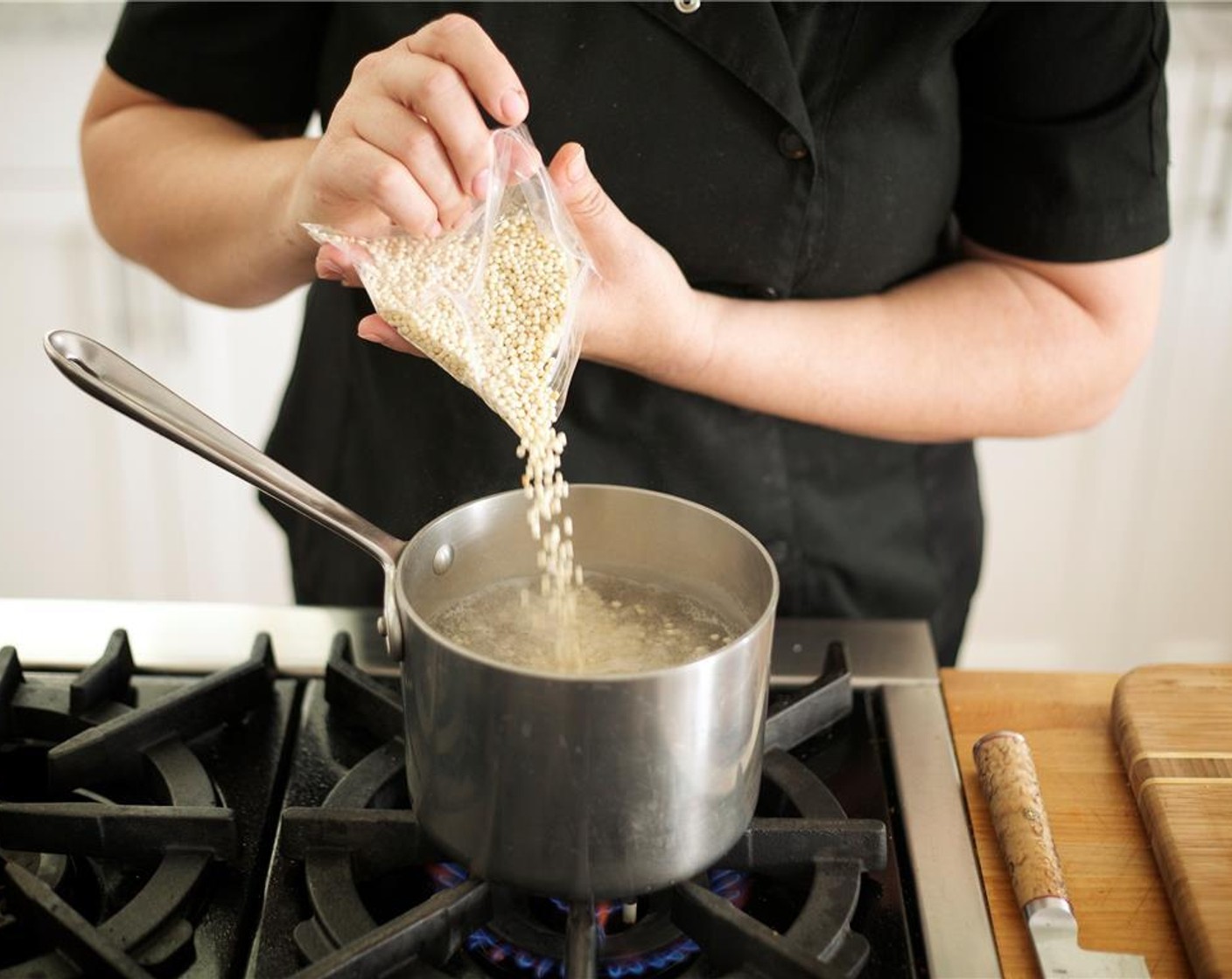 step 8 Bring four cups of water to a boil in a medium saucepan. Add Salt (1/2 Tbsp), Israeli Couscous (2/3 cup), and stir.