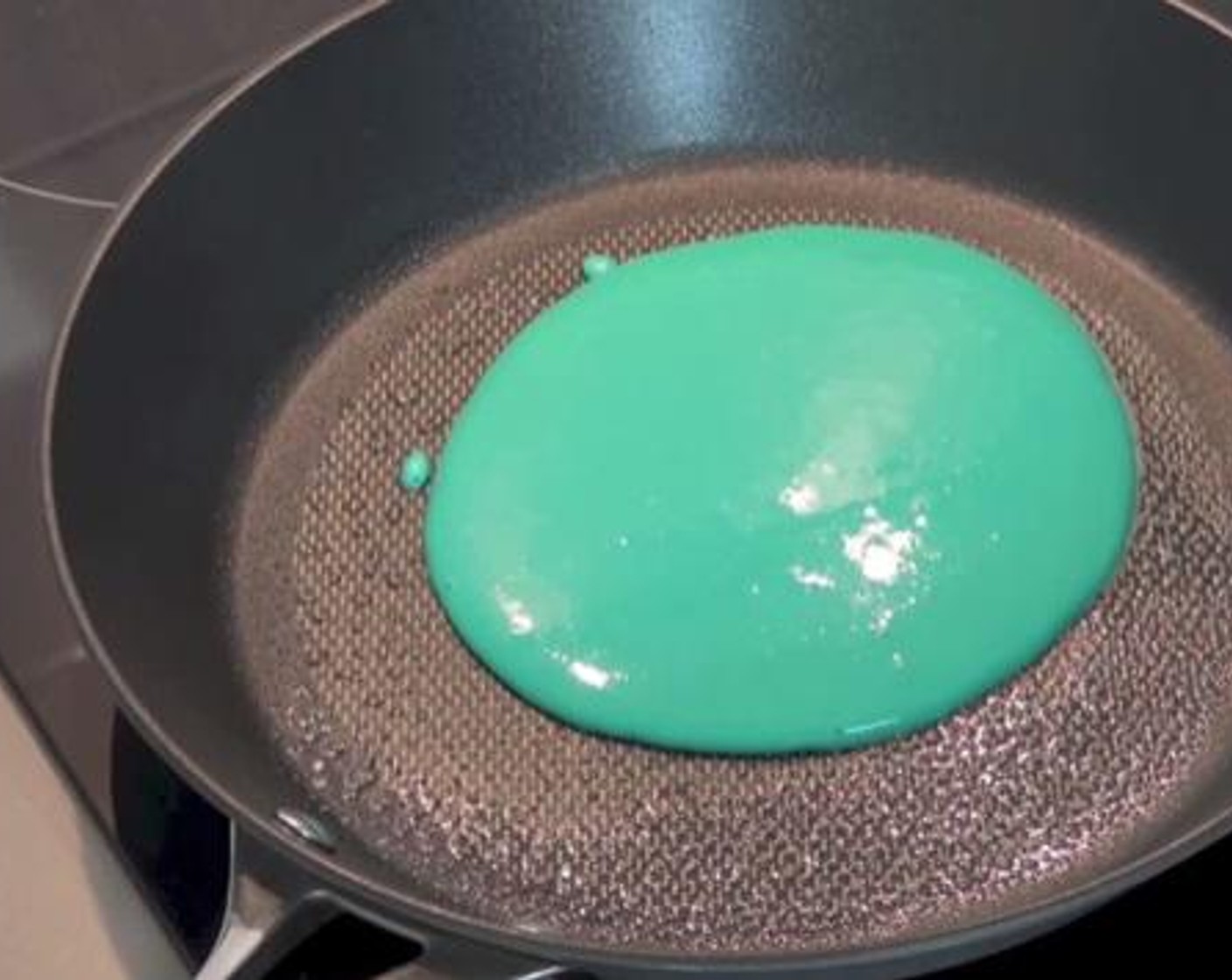 step 5 Grease the frying pan with some Nonstick Cooking Spray (as needed). Cook your pancakes 3 minutes on each side.