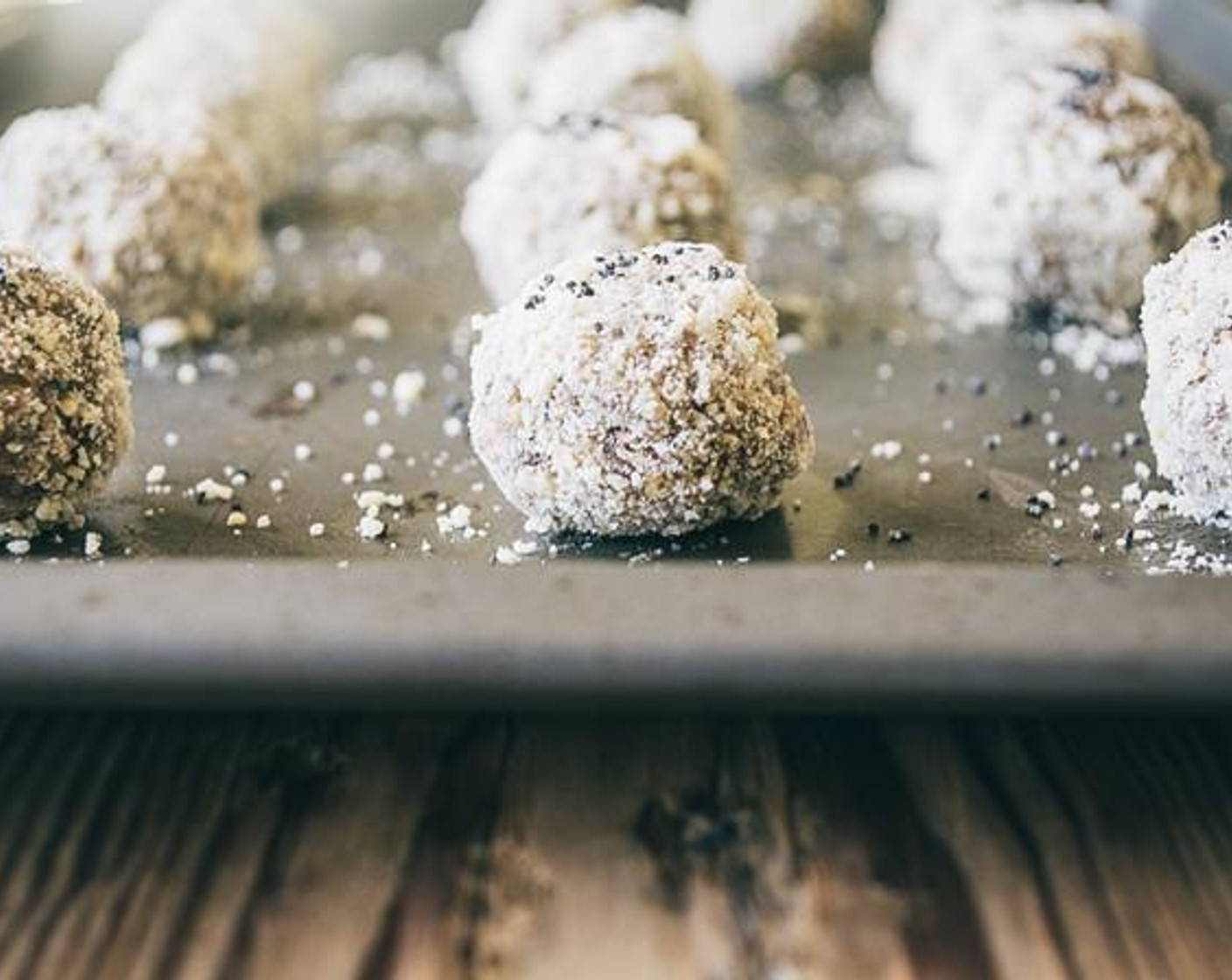 step 2 Line baking sheet with wax paper, then roll dough into small bite size balls, approximately 24 to 28.