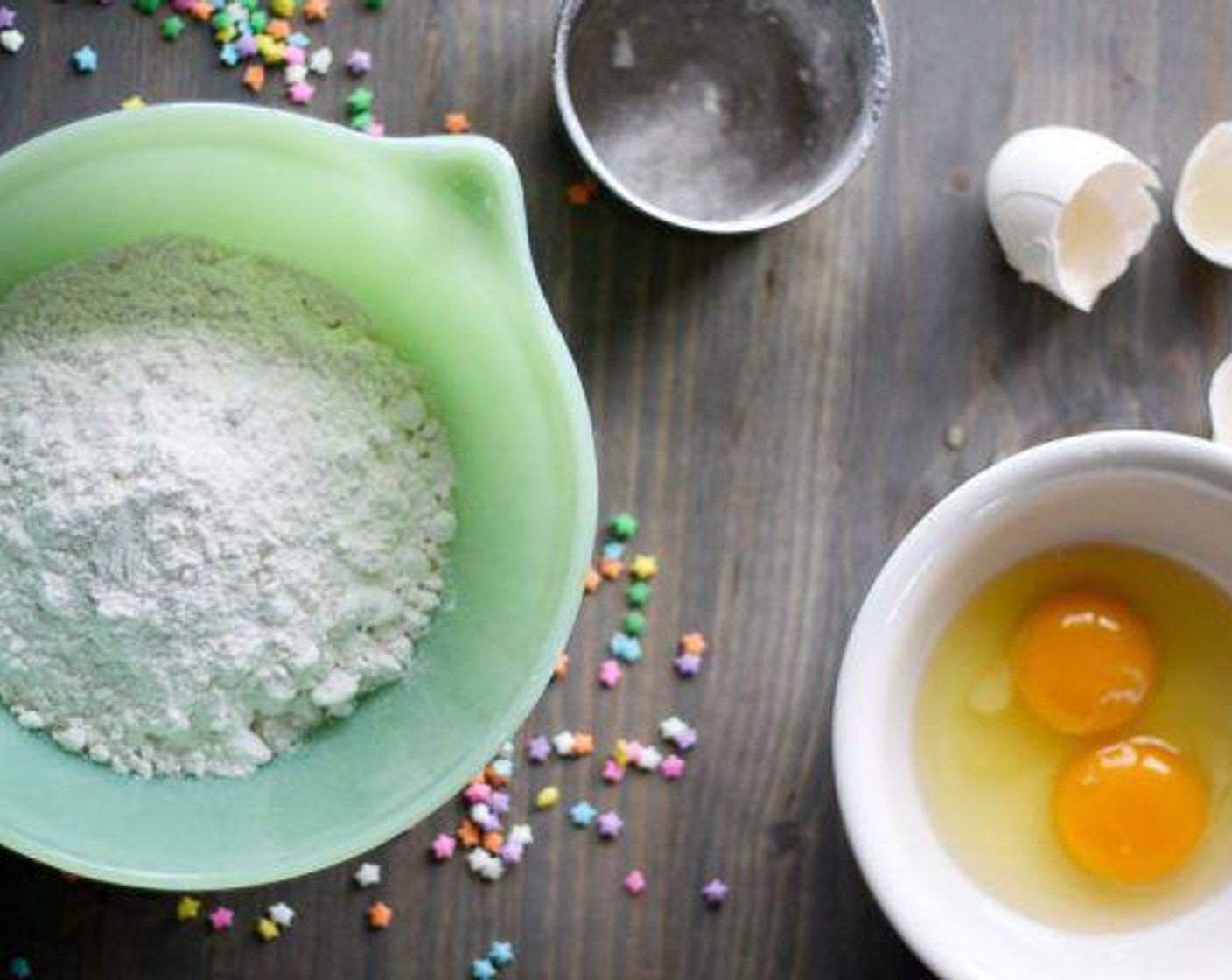 step 1 In a mixing bowl, combine Yellow Cake Mix (2 cups), Milk (1 cup), Eggs (2), and Butter (2 Tbsp) by hand. Stir until just blended.