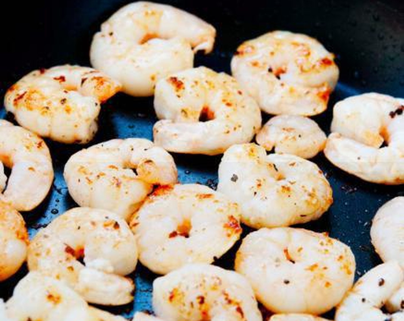 step 7 When the skillet is hot add the shrimp and sear each side 2-3 minutes (depending on the size). When done to your liking, set aside and give a little squeeze of lime.