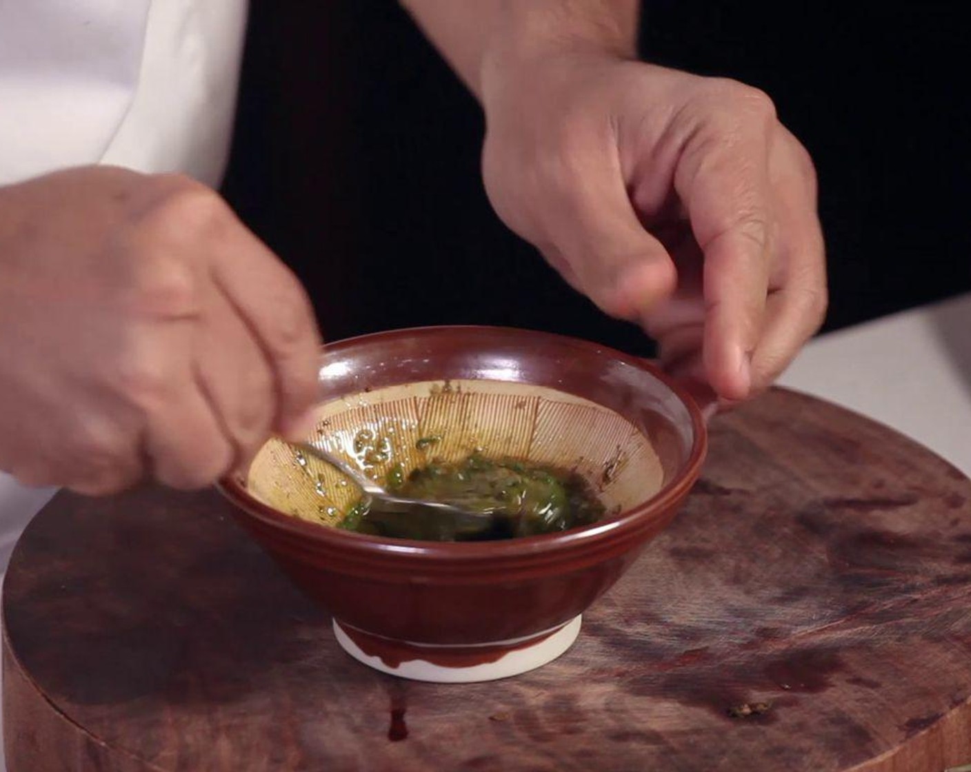 step 2 Prepare the sauce: crush Long Green Peppers (2) and Fresh Basil Leaves (5). Add Vietnamese Spice Blend (1/2 Tbsp), Fish Sauce (1 tsp), Lime (1/4), and Cooking Oil (1 Tbsp). Mix well.