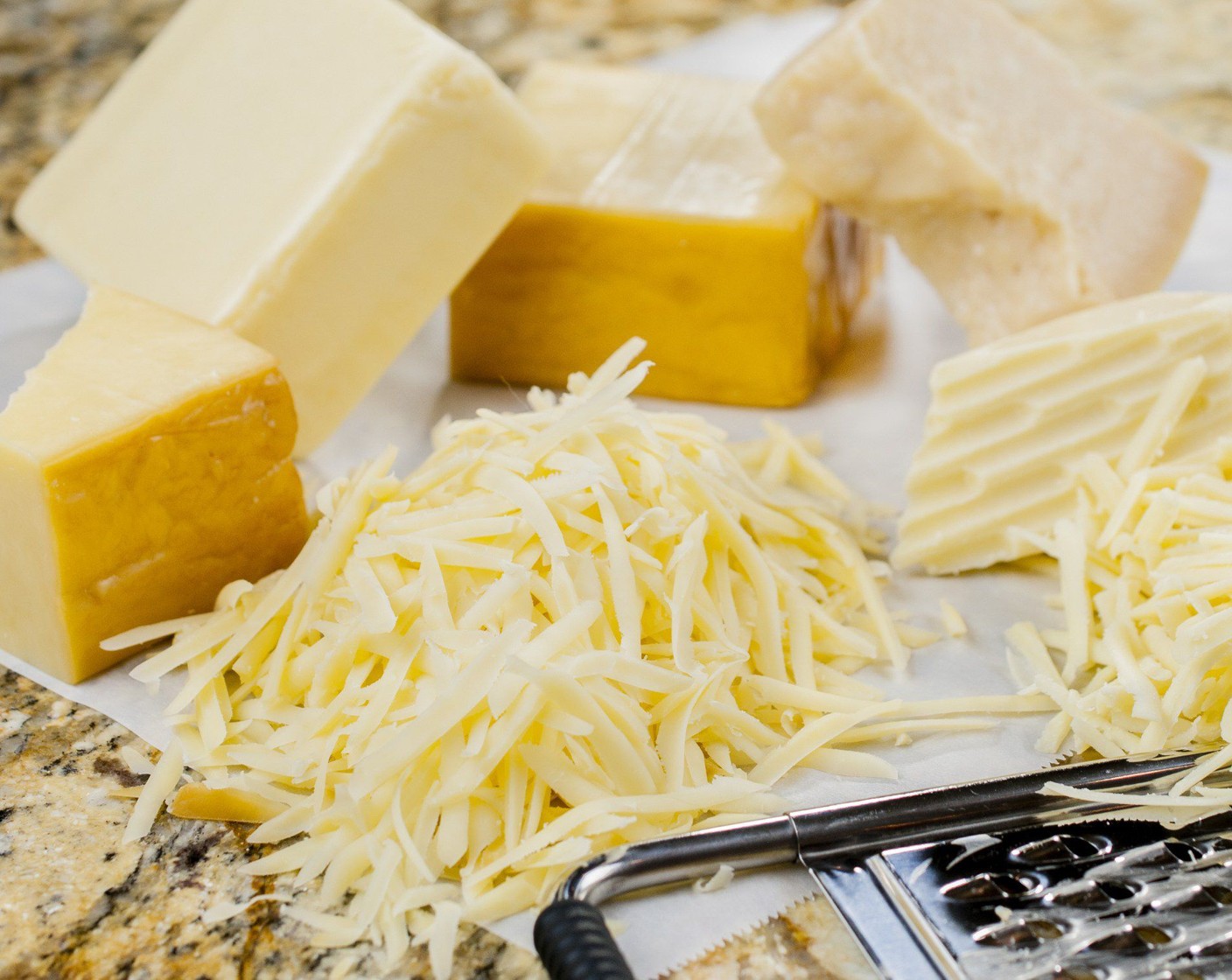 step 10 Toss together White Cheddar Cheese (60 g), Smoked Gouda (55 g) and Parmesan Cheese (4 Tbsp). Set Aside.