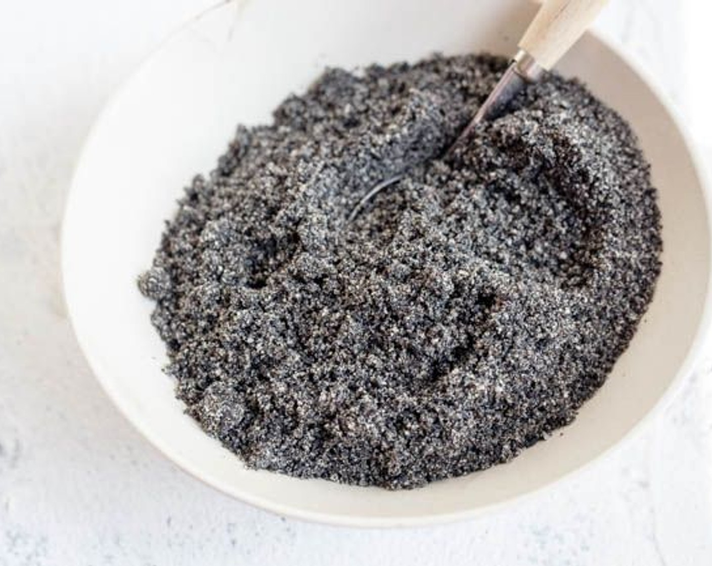 step 1 Toast Black Sesame Seeds (1 cup) in a pan or oven and then ground them into powder. Smaller particles can be accepted for the filling.