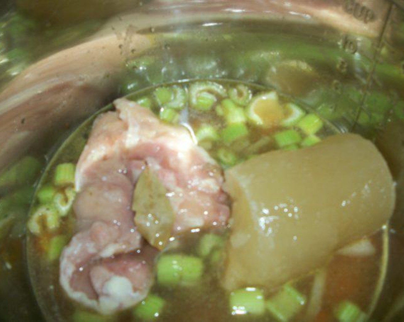 step 3 Add the Water (2 cups). Using a wooden spoon, deglaze the pot of fond left on the bottom. Add the frozen Boneless, Skinless Chicken Thigh (1), Chicken Broth (2 cups), and Bay Leaf (1).