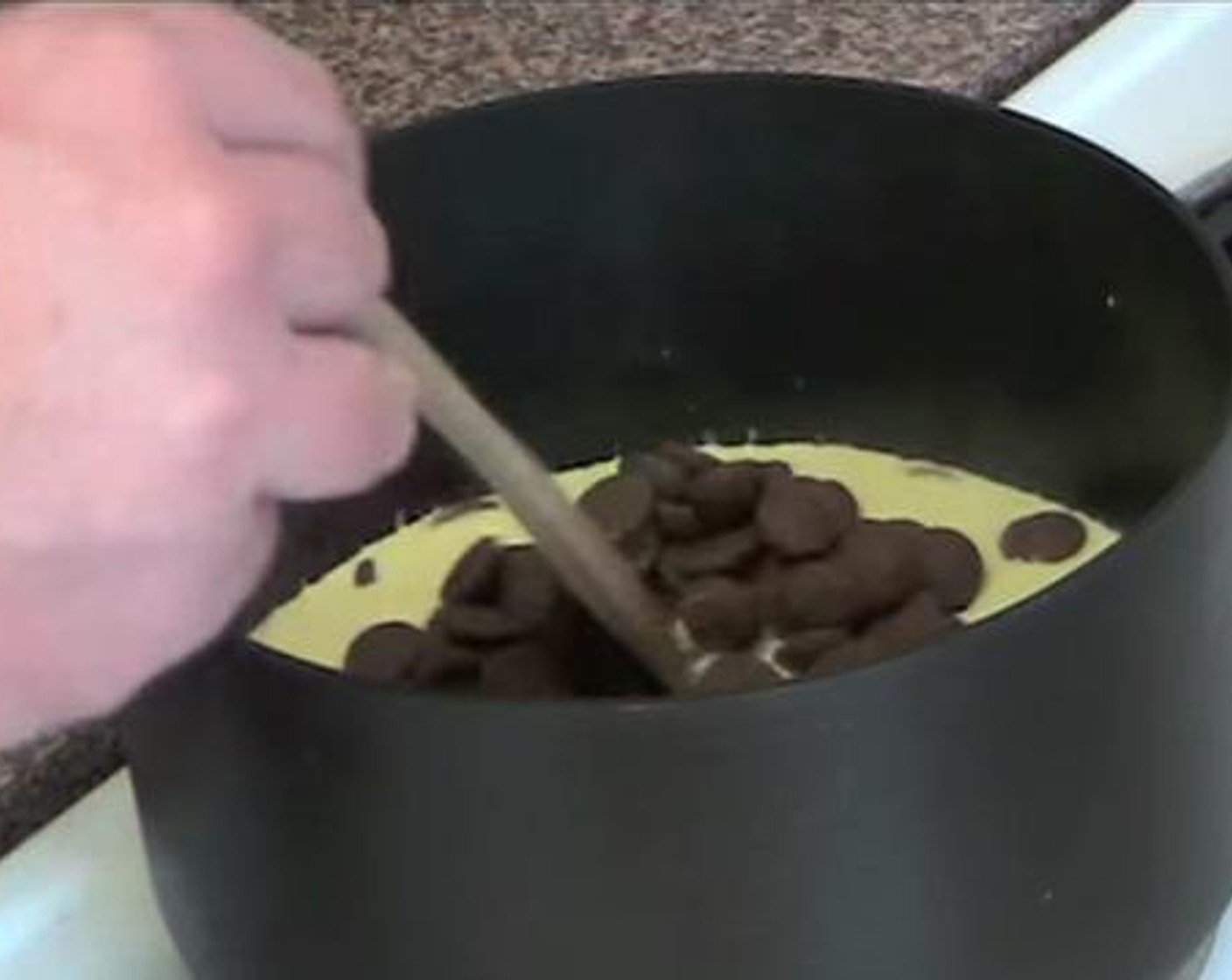 step 3 Add the Milk Chocolate (1 3/4 cups) to the cream. Combine everything well.