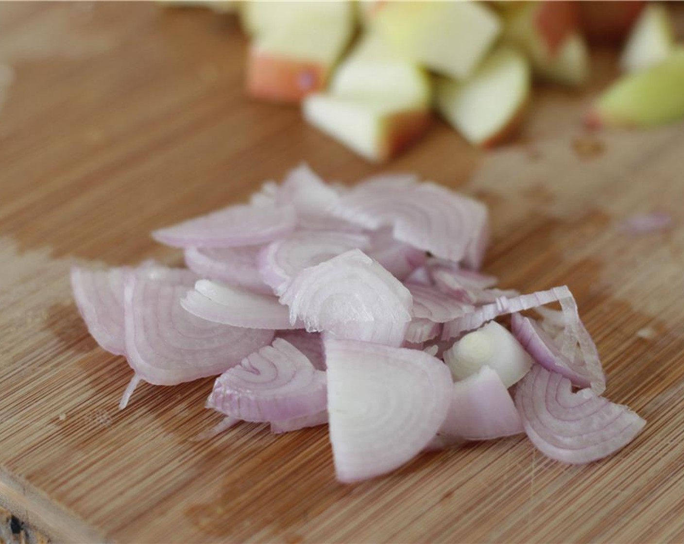 step 4 Thinly slice the Shallot (1) In a small bowl, combine the Apple Cider Vinegar (2 Tbsp), and Orange Champagne Vinegar (2 Tbsp) Add in the sliced shallot and allow to marinate for at least 15 minutes.