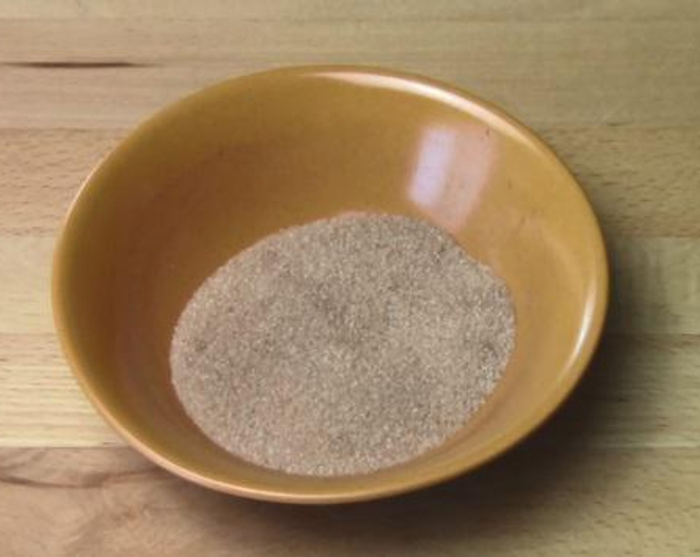 step 1 Into a bowl, add and mix the White Bread (4 slices) and Simply Organic Cinnamon, Ground (2 tsp). Set aside.