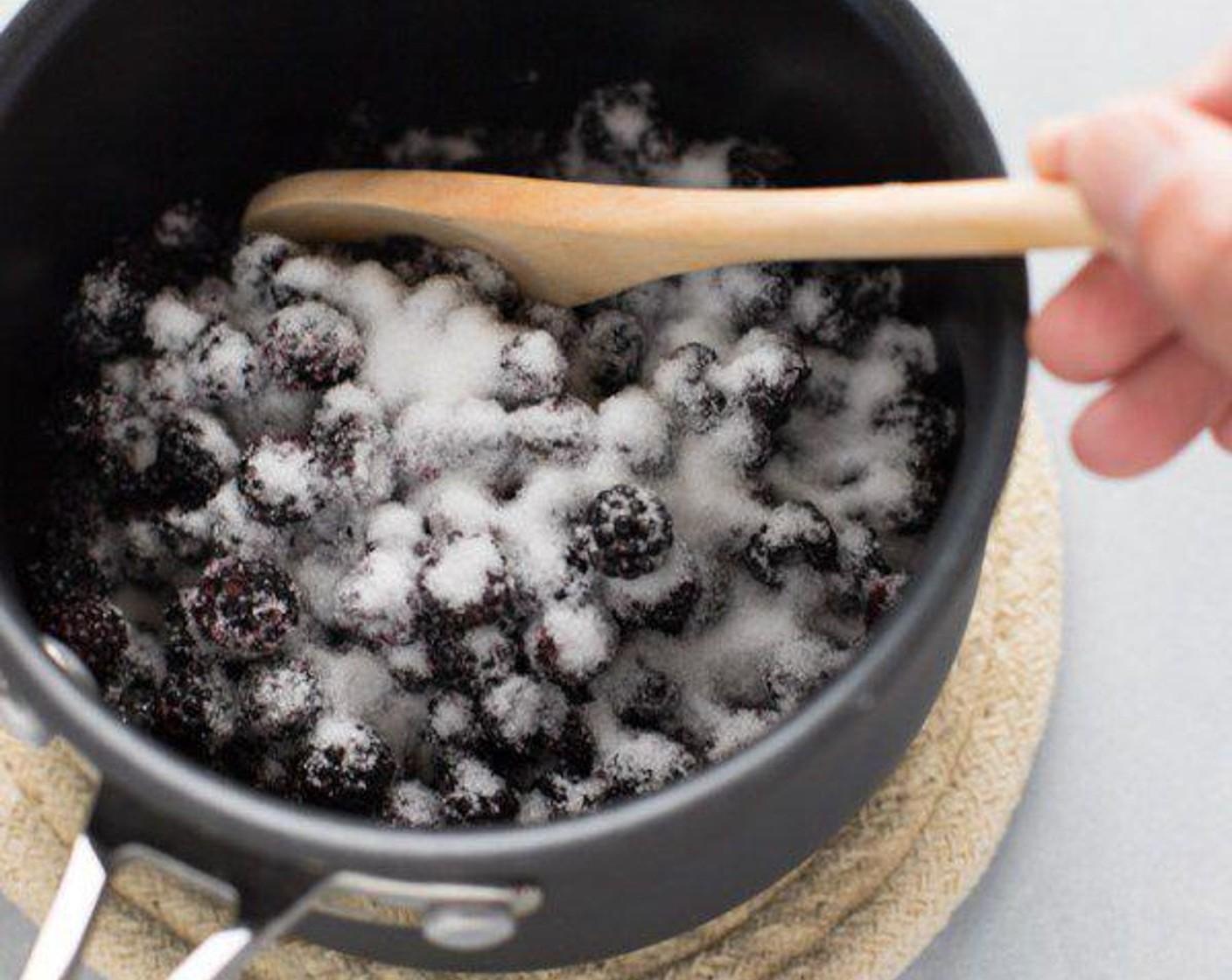 step 2 Cook Black Raspberries (2 cups) and Granulated Sugar (1/4 cup) over medium to low heat for 6-8 minutes. Stir frequently and smash fruit with your utensil to help extract the juice.