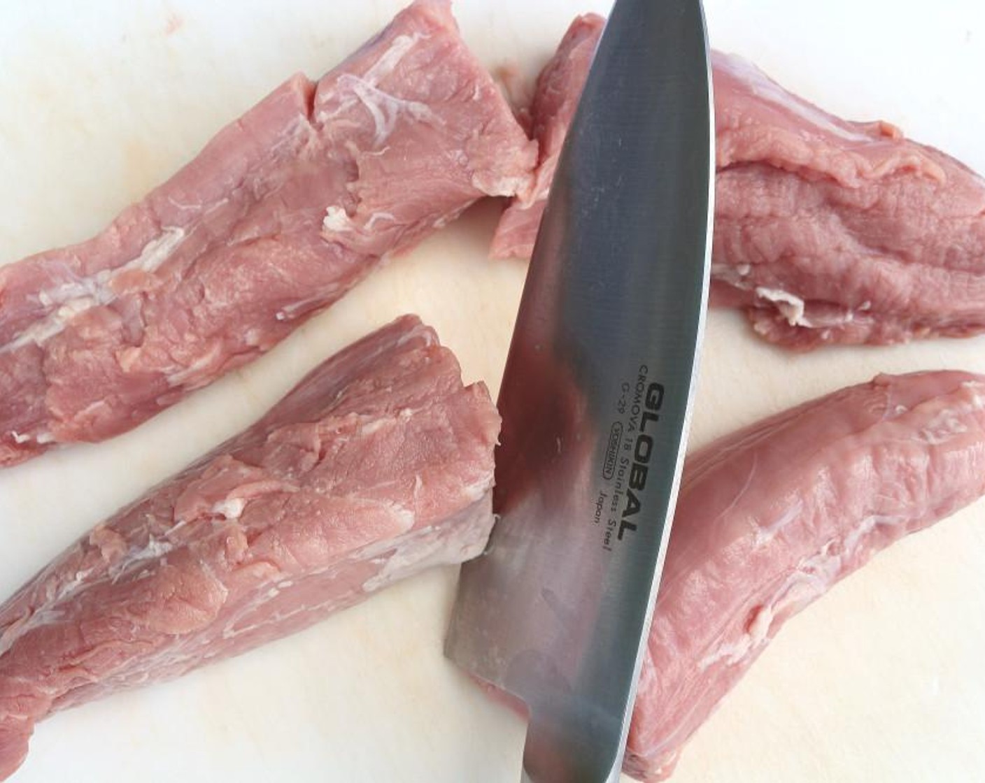 step 1 Clean Pork Tenderloin (2) from silver skin and cut each in half.