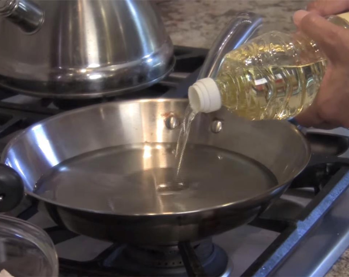 step 8 Heat the Vegetable Oil (as needed) on the stove in a relatively small pan. You just need enough to submerge the tortillas.