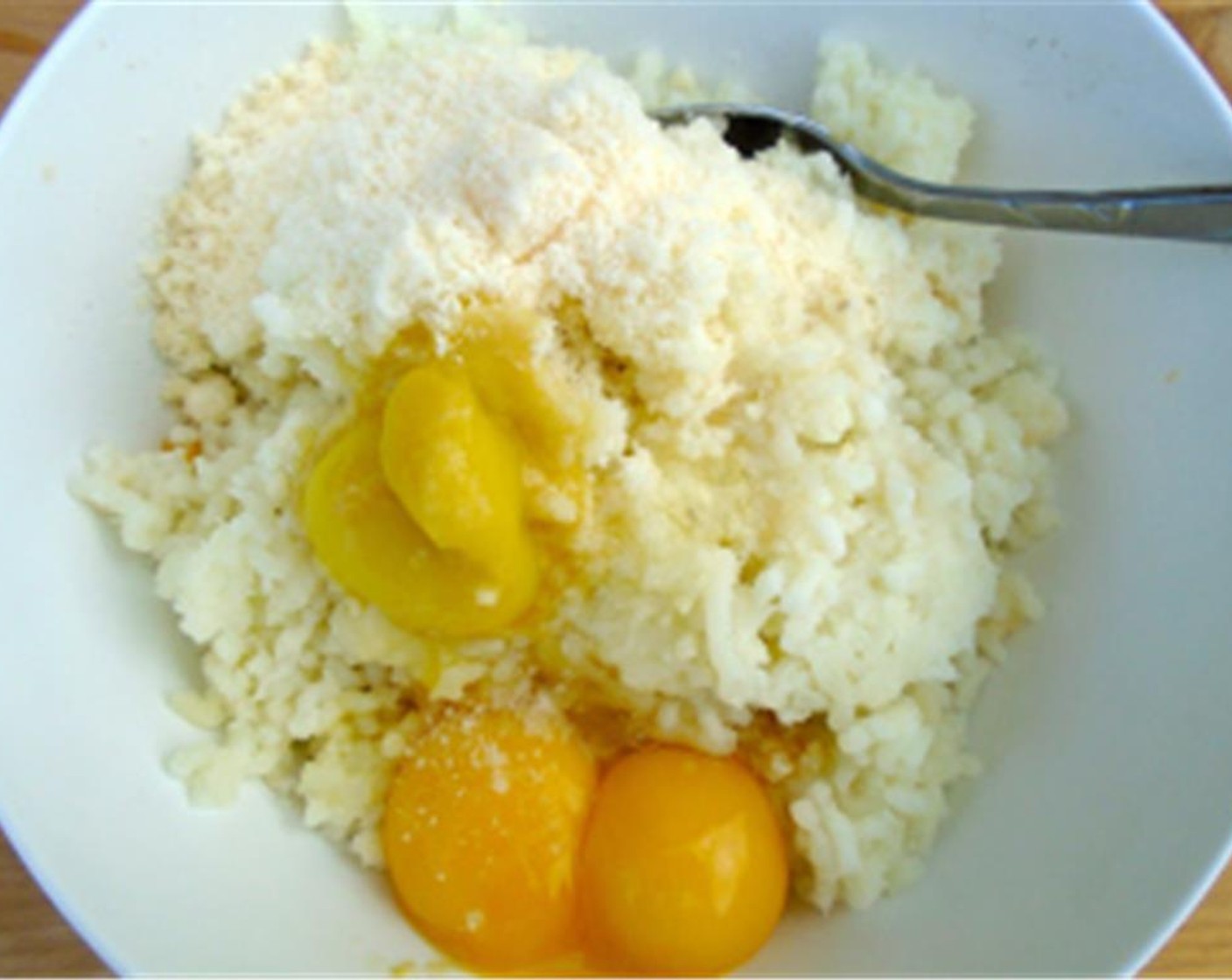 step 3 Meanwhile, rinse Potatoes (3) and blend with Eggland's Best Classic Eggs (2), Garlic Paste (1/2 tsp), Parmesan Cheese (1/3 cup), and Cayenne Pepper (to taste).